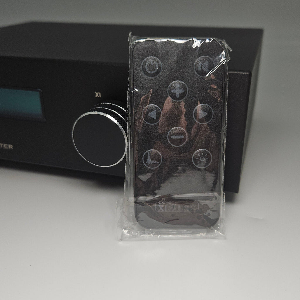 Smart door lock with a clear plastic cover on a white wall