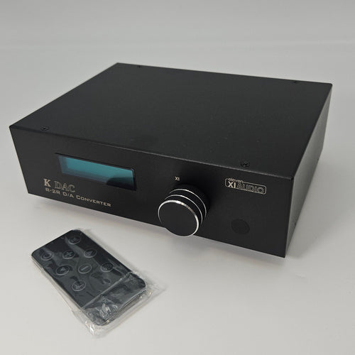Black electronic device with a clear plastic cover on a white background